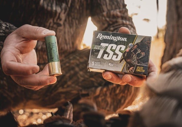 hunting holding Premeier TSS Turkey shotshell and packaging